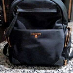 Black, full sized, Michael Kors backpack